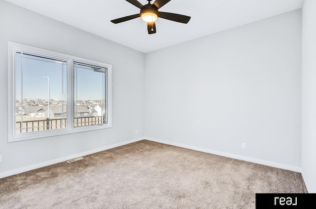 12003 S 109th St, Papillion, NE 68046 - carpeted spare room with baseboards and a ceiling fan