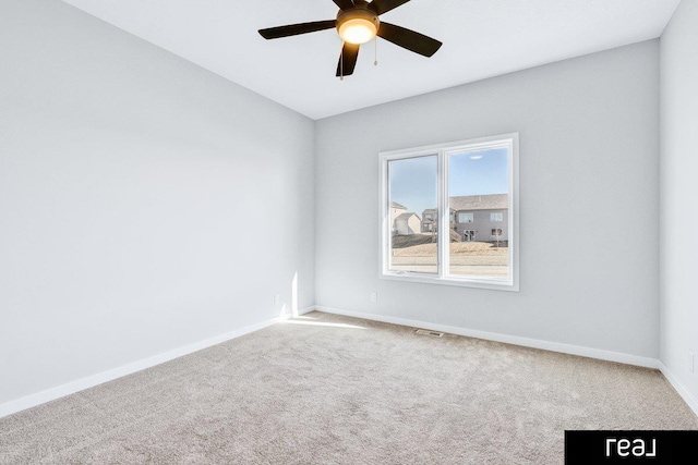 12003 S 109th St, Papillion, NE 68046 - empty room featuring carpet, a ceiling fan, and baseboards