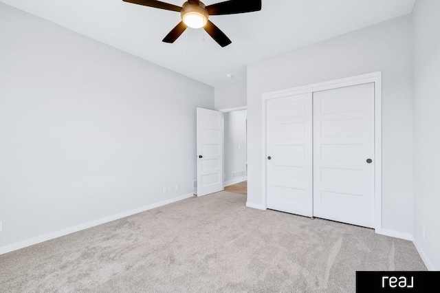 12003 S 109th St, Papillion, NE 68046 - unfurnished bedroom featuring carpet, a closet, baseboards, and ceiling fan