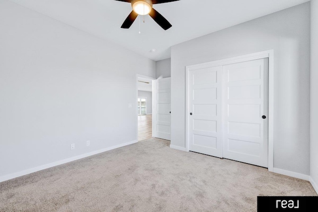 12003 S 109th St, Papillion, NE 68046 - unfurnished bedroom with carpet flooring, baseboards, a closet, and a ceiling fan