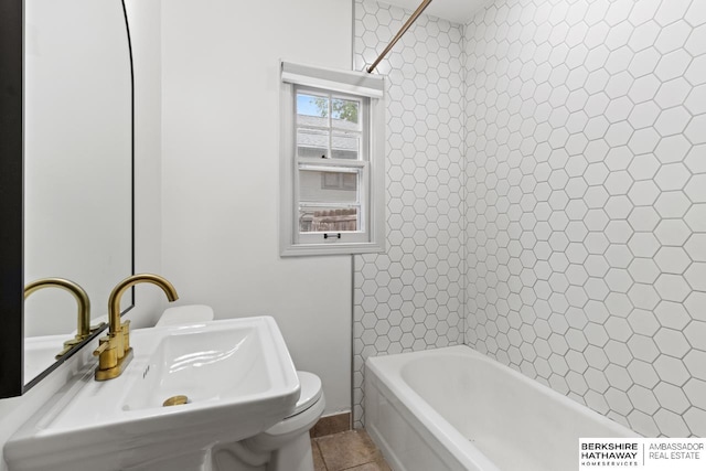 2035 N 50th St, Omaha, NE 68104 - full bath with a sink, toilet, a tub, and tile patterned flooring