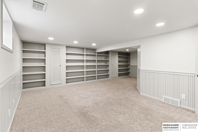 2035 N 50th St, Omaha, NE 68104 - finished basement with recessed lighting, carpet, wainscoting, built in features, and a decorative wall