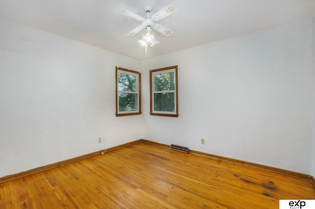 813 Janes View St, Papillion, NE 68046 - spare room featuring baseboards, light wood-style floors, and a ceiling fan