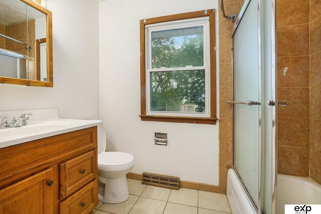 813 Janes View St, Papillion, NE 68046 - bathroom with vanity, tile patterned flooring, toilet, combined bath / shower with glass door, and baseboards