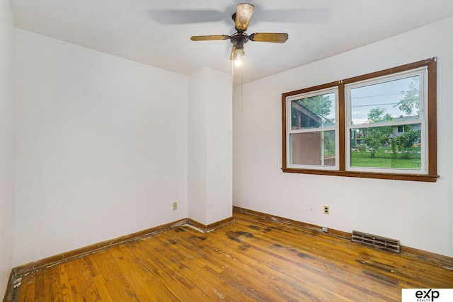 813 Janes View St, Papillion, NE 68046 - spare room with wood-type flooring, ceiling fan, and baseboards