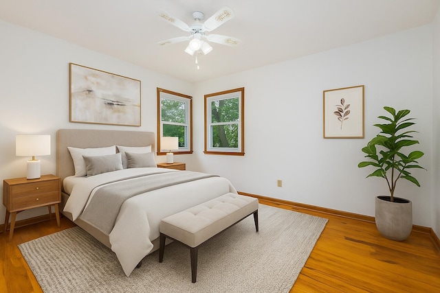 813 Janes View St, Papillion, NE 68046 - bedroom with baseboards, light wood-style floors, and ceiling fan