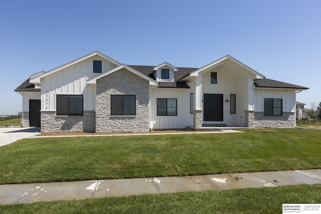 5717 S 200th Cir, Omaha, NE 68135 - modern farmhouse with board and batten siding, stone siding, and a front yard
