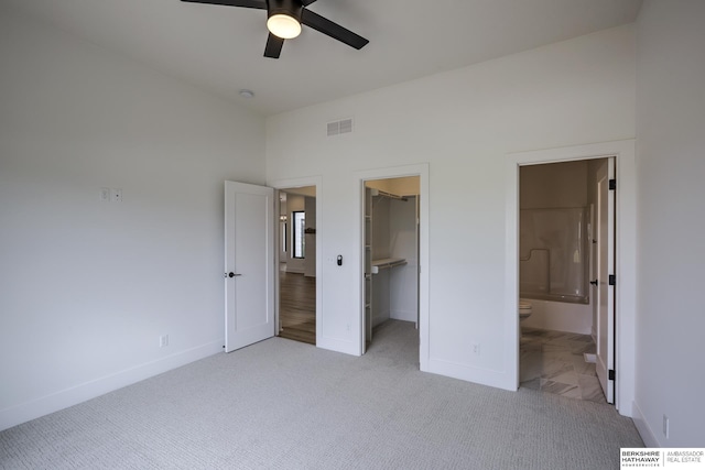 5717 S 200th Cir, Omaha, NE 68135 - unfurnished bedroom featuring light colored carpet, a spacious closet, baseboards, a closet, and ensuite bathroom