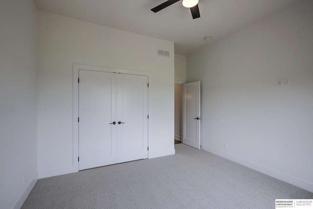 5717 S 200th Cir, Omaha, NE 68135 - unfurnished bedroom with light carpet, baseboards, and a closet