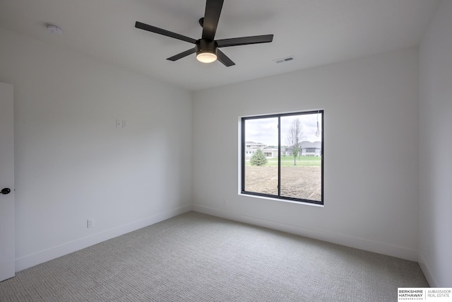 5717 S 200th Cir, Omaha, NE 68135 - carpeted spare room featuring a ceiling fan, a smoke detector, and baseboards