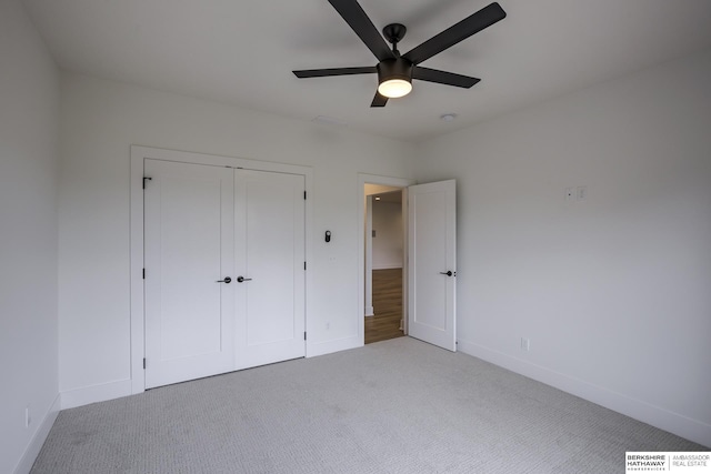 5717 S 200th Cir, Omaha, NE 68135 - unfurnished bedroom featuring light colored carpet, baseboards, and a closet