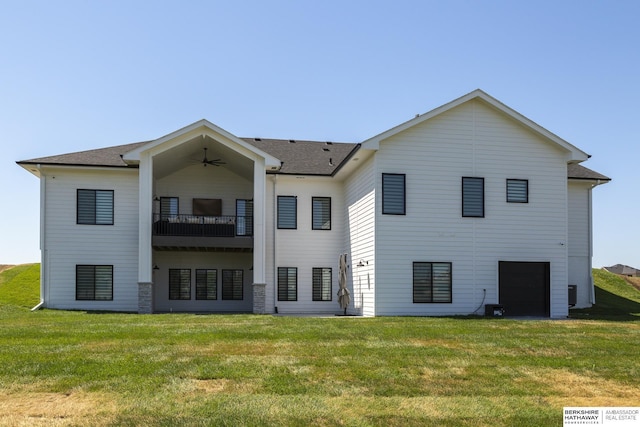 5717 S 200th Cir, Omaha, NE 68135 - back of property featuring a balcony, ceiling fan, a lawn, and roof with shingles