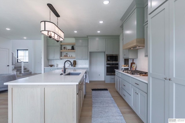 6617 S 214th St, Omaha, NE 68022 - kitchen featuring a sink, stainless steel appliances, open shelves, decorative backsplash, and recessed lighting