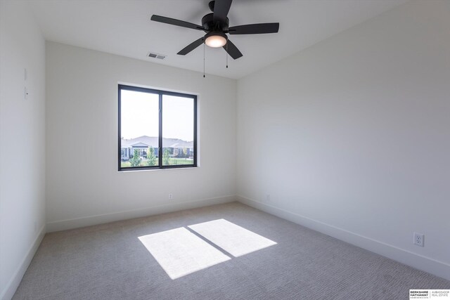 6617 S 214th St, Omaha, NE 68022 - unfurnished room featuring light colored carpet, baseboards, and ceiling fan
