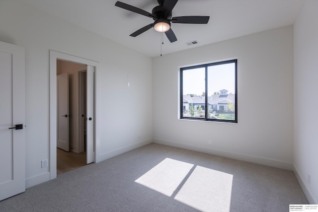6617 S 214th St, Omaha, NE 68022 - unfurnished room with light carpet, ceiling fan, and baseboards