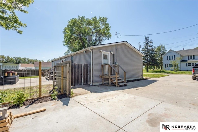 210 4th St, Ithaca, NE 68033 - rear view of house featuring a patio area