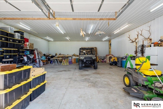 210 4th St, Ithaca, NE 68033 - garage with freestanding refrigerator