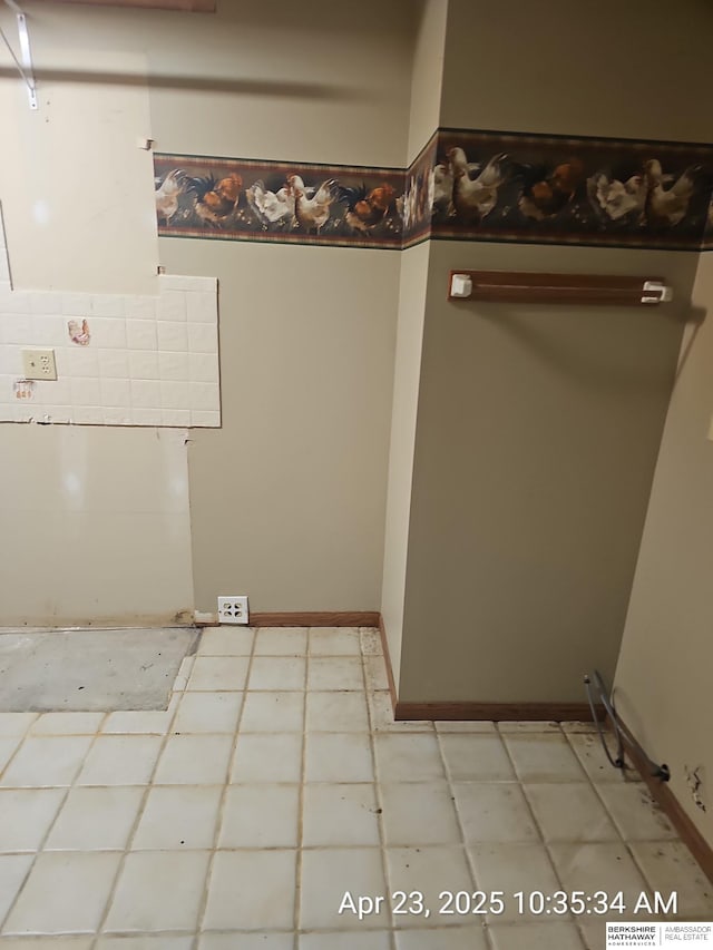 15911 S 234th St, Gretna, NE 68028 - laundry room with light flooring and baseboards