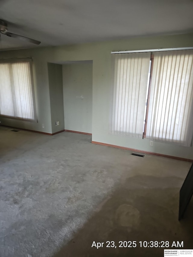15911 S 234th St, Gretna, NE 68028 - unfurnished room featuring a ceiling fan, baseboards, and concrete flooring