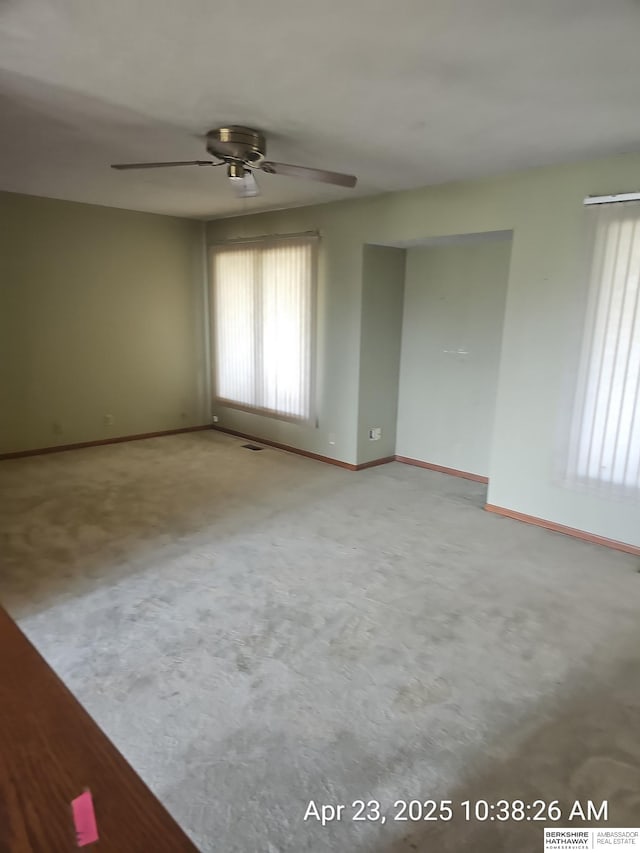 15911 S 234th St, Gretna, NE 68028 - carpeted empty room featuring a ceiling fan and baseboards