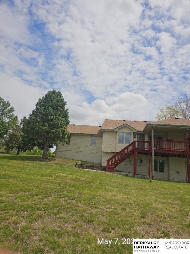 15911 S 234th St, Gretna, NE 68028 - rear view of house featuring stairway, a wooden deck, and a yard