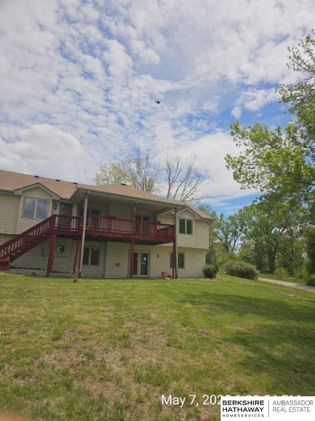 15911 S 234th St, Gretna, NE 68028 - rear view of house with a wooden deck, a lawn, and stairway