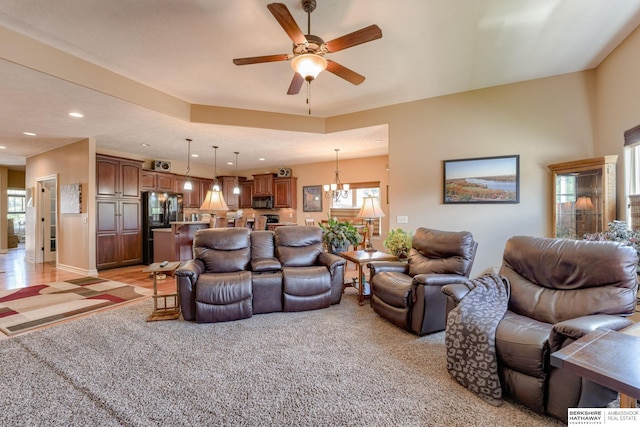 18855 Mason Plz, Omaha, NE 68022 - living room featuring ceiling fan, a chandelier, recessed lighting, and light carpet