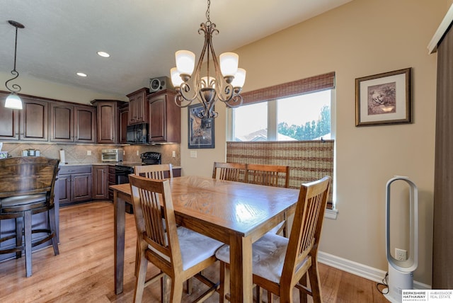 18855 Mason Plz, Omaha, NE 68022 - dining room featuring a chandelier, light wood-style flooring, recessed lighting, and baseboards