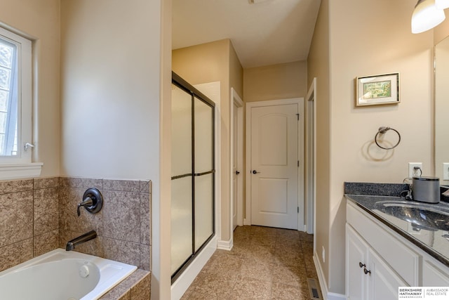 18855 Mason Plz, Omaha, NE 68022 - bathroom with a stall shower, vanity, a bath, and tile patterned floors