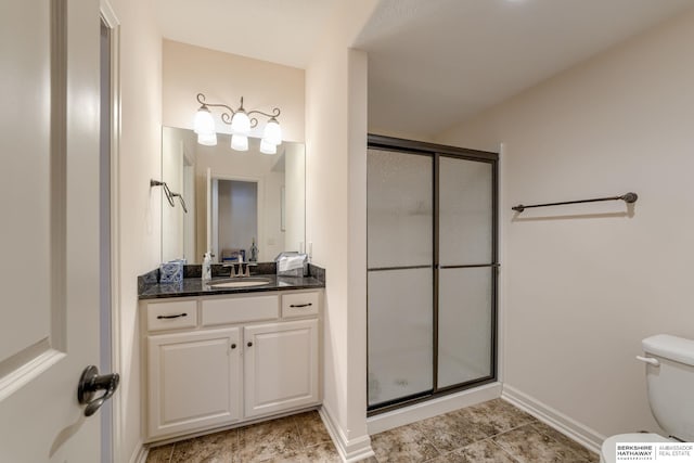 18855 Mason Plz, Omaha, NE 68022 - bathroom with vanity, a shower stall, toilet, and baseboards