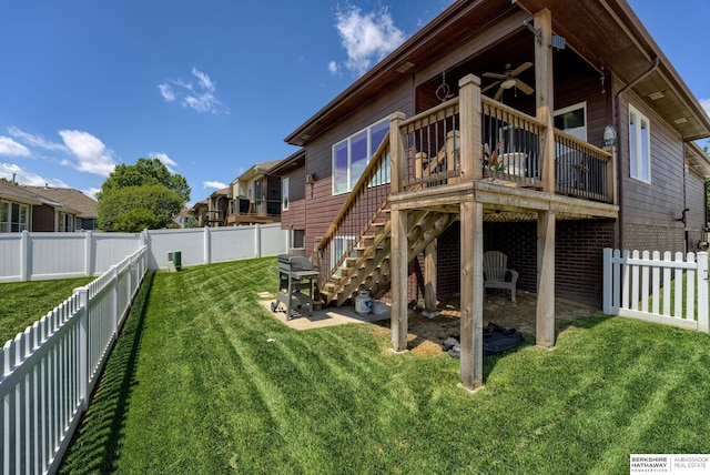 18855 Mason Plz, Omaha, NE 68022 - back of house featuring ceiling fan, stairs, and a wooden deck