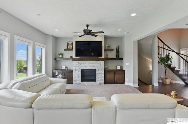 20956 Pine Cir, Elkhorn, NE 68022 - living room with a ceiling fan, stairs, baseboards, recessed lighting, and a fireplace