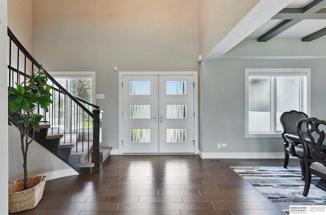 20956 Pine Cir, Elkhorn, NE 68022 - entryway with french doors, a towering ceiling, stairway, baseboards, and wood finished floors