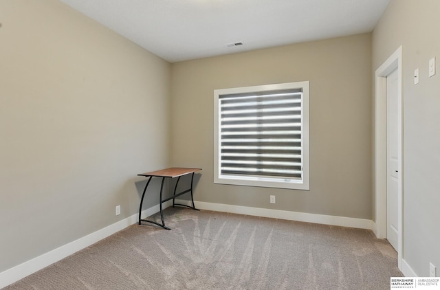 20956 Pine Cir, Elkhorn, NE 68022 - carpeted empty room featuring baseboards