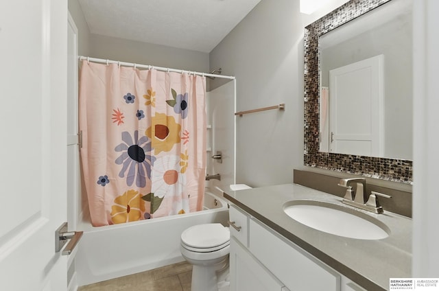 20956 Pine Cir, Elkhorn, NE 68022 - full bathroom with vanity, toilet, shower / bath combo with shower curtain, tile patterned flooring, and decorative backsplash
