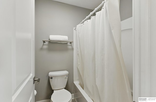 20956 Pine Cir, Elkhorn, NE 68022 - bathroom featuring toilet and shower / bath combination with curtain