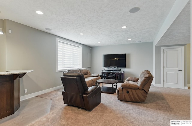 20956 Pine Cir, Elkhorn, NE 68022 - living area featuring recessed lighting, baseboards, a textured ceiling, and light colored carpet