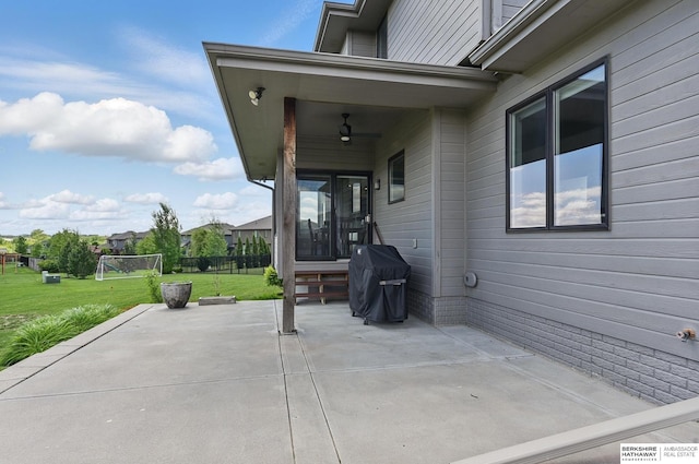 20956 Pine Cir, Elkhorn, NE 68022 - view of patio featuring area for grilling and a ceiling fan