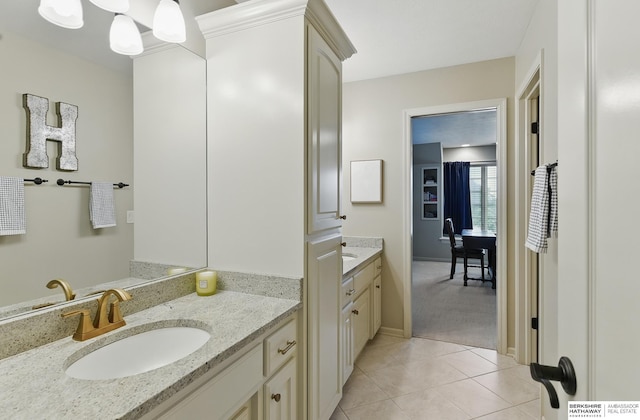 2025 S 189th Cir, Omaha, NE 68130 - bathroom with vanity, tile patterned floors, and baseboards