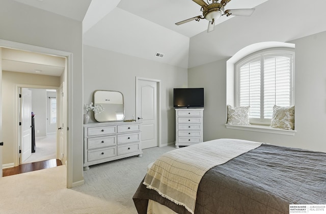 2025 S 189th Cir, Omaha, NE 68130 - bedroom featuring light carpet, vaulted ceiling, baseboards, and a ceiling fan