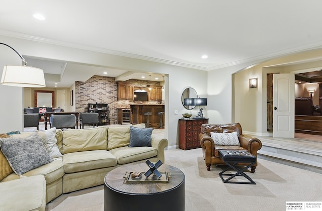 2025 S 189th Cir, Omaha, NE 68130 - living room featuring beverage cooler, arched walkways, baseboards, recessed lighting, and crown molding