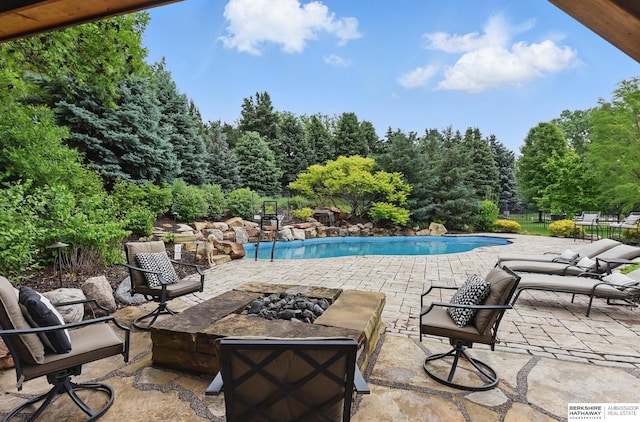 2025 S 189th Cir, Omaha, NE 68130 - swimming pool featuring a fire pit and a patio