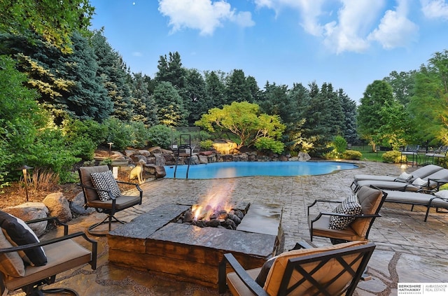 2025 S 189th Cir, Omaha, NE 68130 - view of patio featuring an outdoor fire pit and an outdoor pool