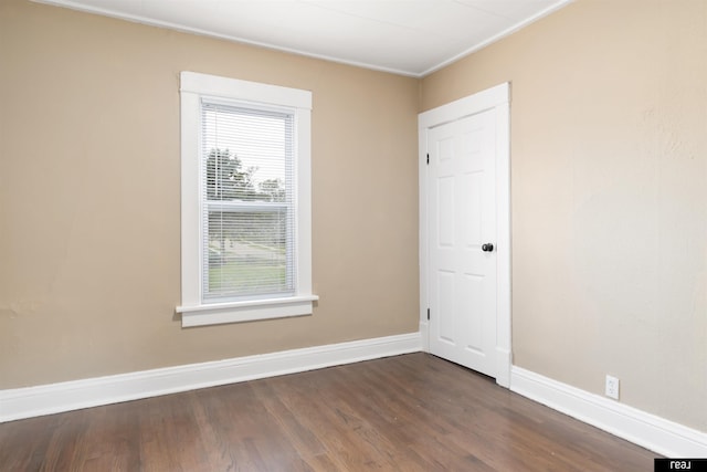 6935 Binney St, Omaha, NE 68104 - unfurnished room with dark wood-style floors and baseboards