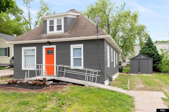 6935 Binney St, Omaha, NE 68104 - view of front of house featuring a front lawn and roof with shingles