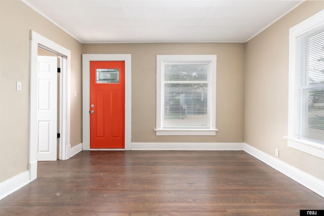 6935 Binney St, Omaha, NE 68104 - foyer entrance with wood finished floors, baseboards, and ornamental molding