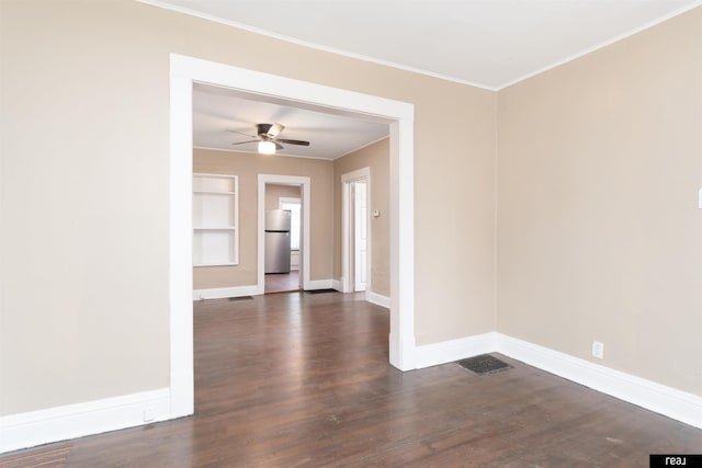 6935 Binney St, Omaha, NE 68104 - unfurnished room featuring dark wood finished floors, baseboards, built in features, ornamental molding, and ceiling fan