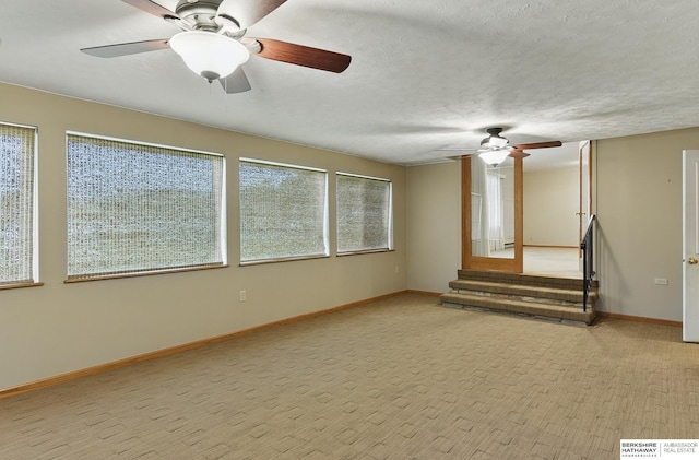 2417 Fairway Dr, Fremont, NE 68025 - carpeted empty room featuring ceiling fan and baseboards