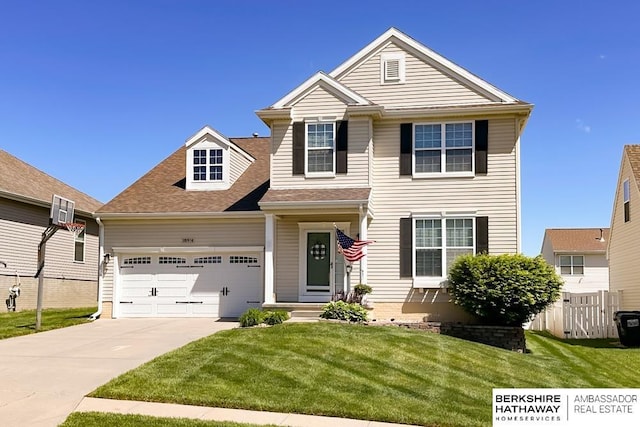 18914 C St, Omaha, NE 68130 - traditional-style home with a garage, driveway, and a shingled roof