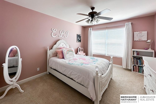 18914 C St, Omaha, NE 68130 - bedroom with light colored carpet, baseboards, and ceiling fan